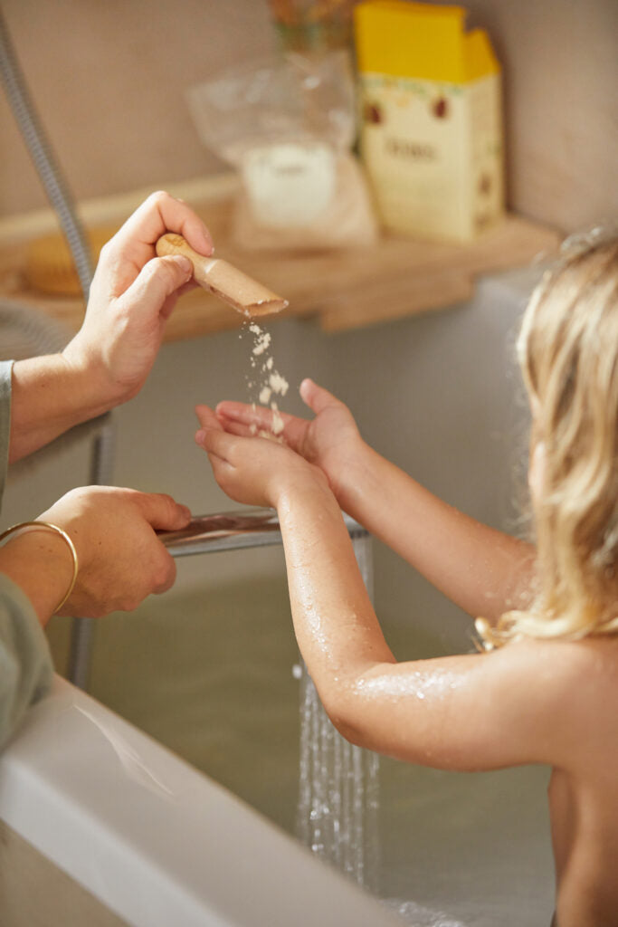 Soothing baby bath with oats and coconut